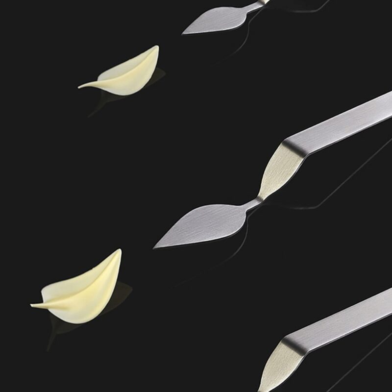 STAINLESS STEEL SPOON DECORATED WITH LEAF "L" 80X40MM