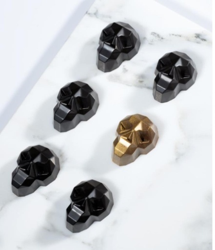 [54402141] MOULE PRALINES POLYCARBONATE TETE DE MORT SKULLFACETTE 37X28MM 10GR